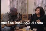 Janet Choi smoking a cigarette