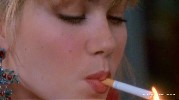 Christina Applegate smoking a cigarette