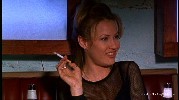 Joey Lauren Adams smoking a cigarette