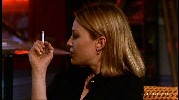 Joey Lauren Adams smoking a cigarette