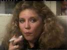 Nancy Allen smoking a cigarette