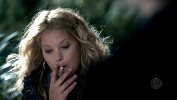 Nicki Lynn Aycox smoking a cigarette
