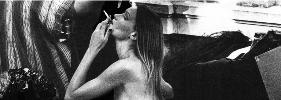 Carla Bruni smoking a cigarette