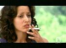 Jennifer Beals smoking a cigarette
