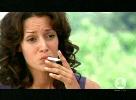 Jennifer Beals smoking a cigarette