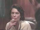 Lara Flynn Boyle smoking a cigarette