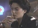 Lara Flynn Boyle smoking a cigarette