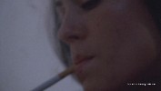 Michelle Borth smoking a cigarette