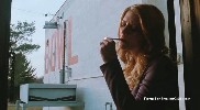 Mischa Barton smoking a cigarette
