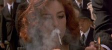 Monica Bellucci smoking a cigarette