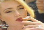 Paola Barale smoking a cigarette