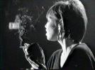 Pat Benatar smoking a cigarette