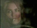 Kristen Cloke smoking a cigarette