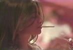 Penelope Cruz smoking a cigarette