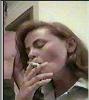 Gia Carides smoking a cigarette