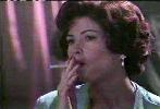Dana Delany smoking a cigarette