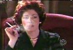 Dana Delany smoking a cigarette