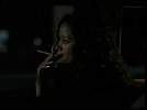 Stacey Dash smoking a cigarette