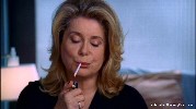 Catherine Deneuve smoking a cigarette