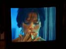 Carlton Elizabeth smoking a cigarette