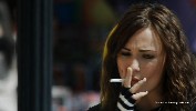 Briana Evigan smoking a cigarette