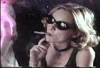 Calista Flockhart smoking a cigarette