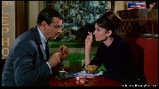 Audrey Hepburn smoking a cigarette