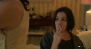 Anne Hathaway smoking a cigarette