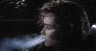 Barbara Hershey smoking a cigarette