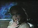 Linda Hamilton smoking a cigarette