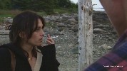 Amy Jo Johnson smoking a cigarette