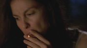 Ashley Judd smoking a cigarette