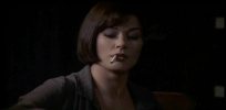 Catherine Zeta Jones smoking a cigarette