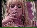Jill Kelly smoking a cigarette